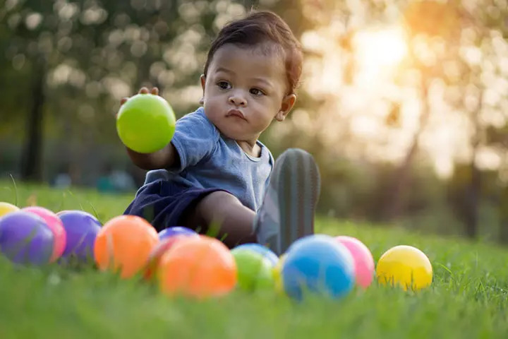 Playing with a ball, outdoor activities for babies