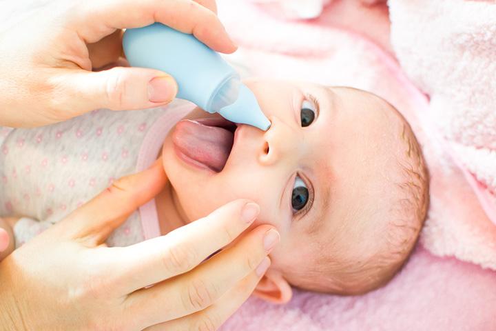 Suck mucus to stop the baby from spitting up mucus