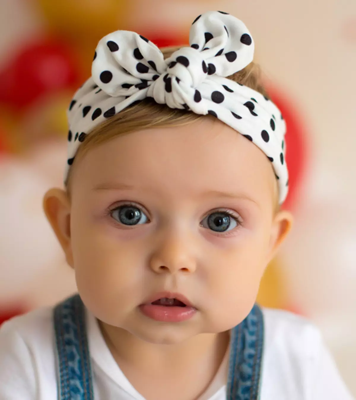 A small girl with a beautiful angel dress