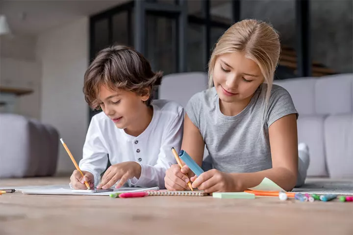 Siblings studying together