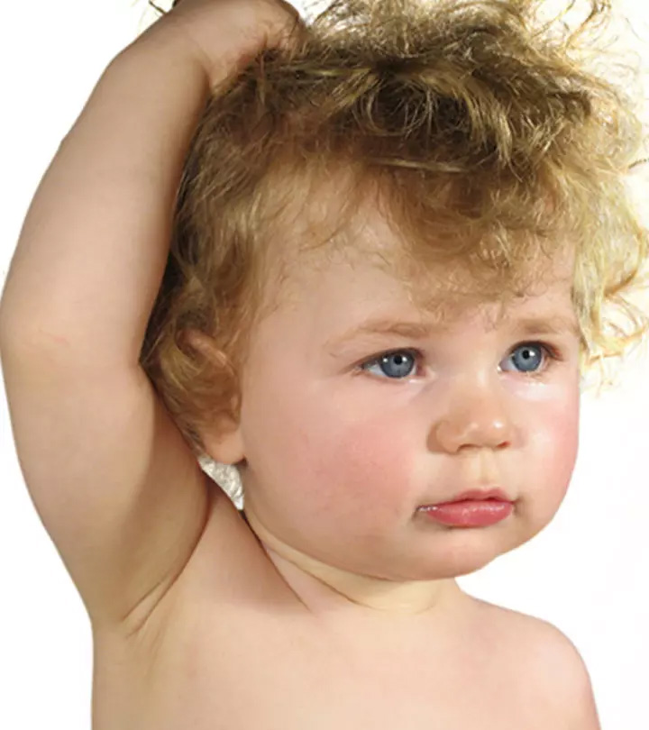 6 Reasons Why Baby Pulls Own Hair And Tips to Manage