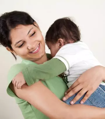 Want to know the right way to hold a newborn baby in your arms Read on