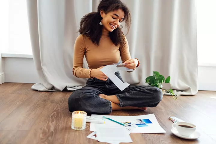 Teenager preparing for a scrapbook project