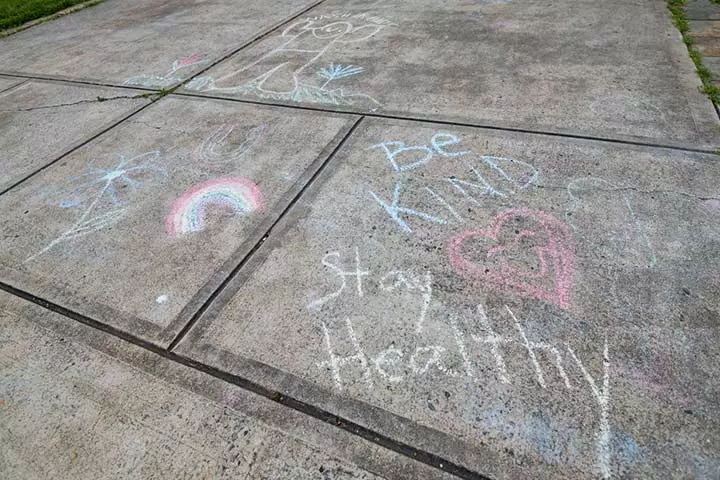 Writing sidewalk messages, kindness activity for kids