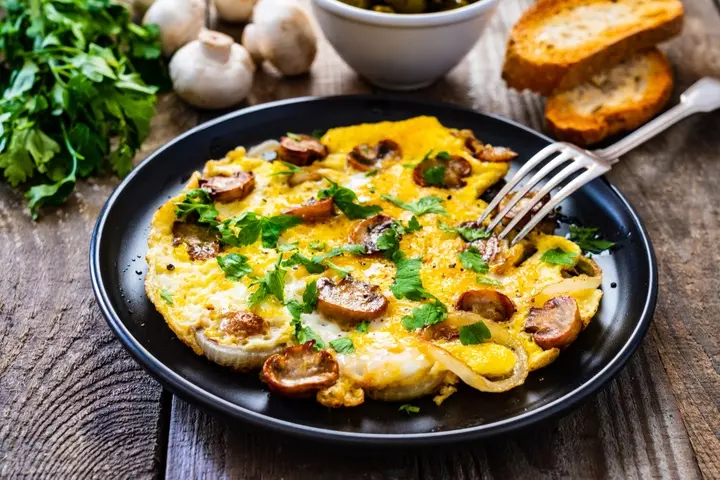 Vegetable omelet with multigrain bread breakfast for kids