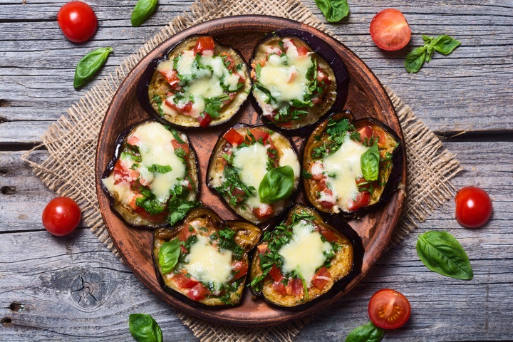 mini-pizza-eggplant-tomato-basil-top-666576094