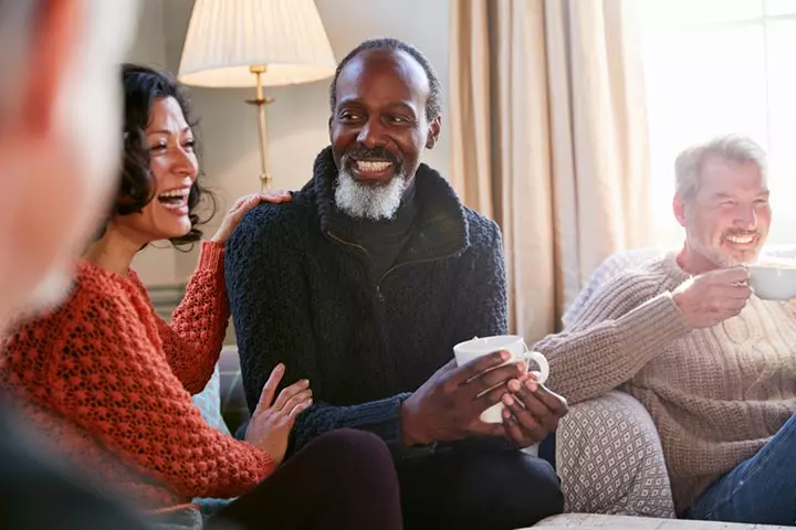 Couple telling their friend the secret to a lasting marriage