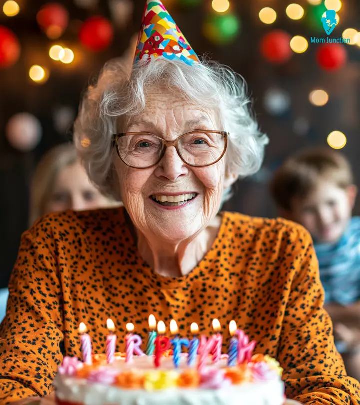 A girl wishing an 80th birthday to an older woman