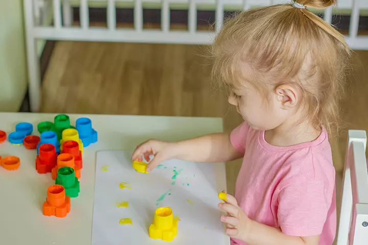 Pre-formed stamps with finger paint for toddlers