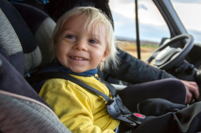 When Can A Child Sit In The Front Seat? Risks & Safety Tips