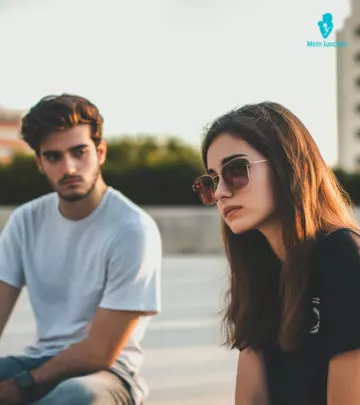 Couple Looking Distant And Unhappy Showing A Relationship Is Over