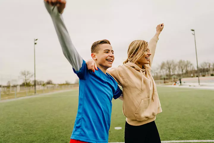 Mom cheering her teenage son