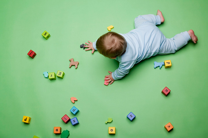 Playing on a textured mat as gross motor activities for infants