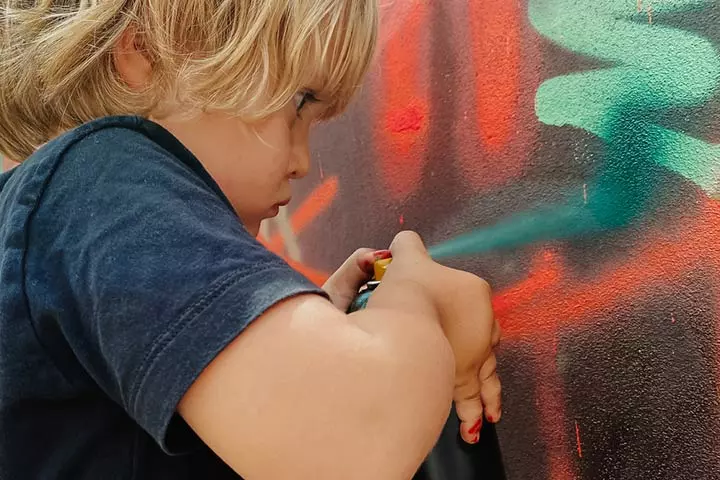 Spray painting and outdoor games for toddlers