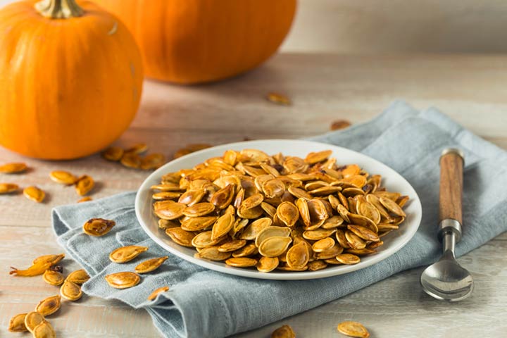 Roasting pumpkin seeds activity for toddlers
