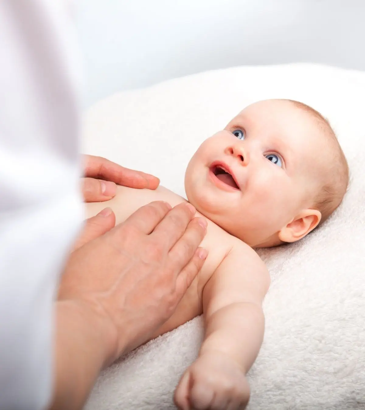 Baby Enjoying Massage For Gas Pain