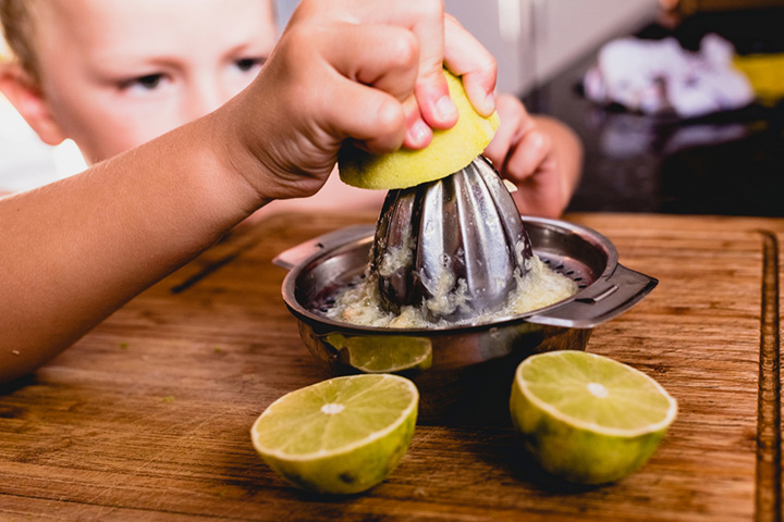 Squeezing lemons for deep breathing exercises for kids
