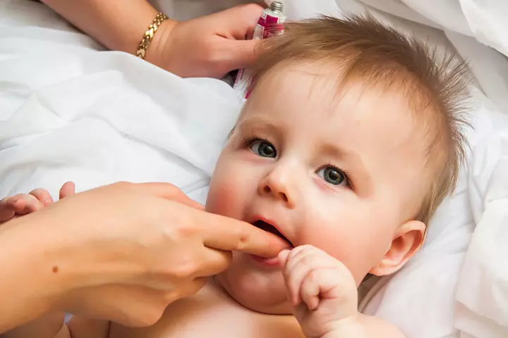 Gently Rub Your Baby's Gums