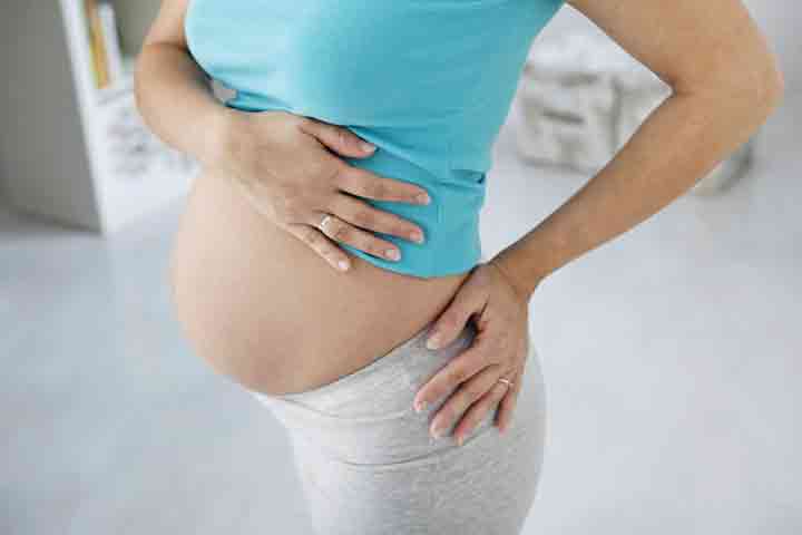 It is important to look out for symptoms of preeclampsia such as lower back pain