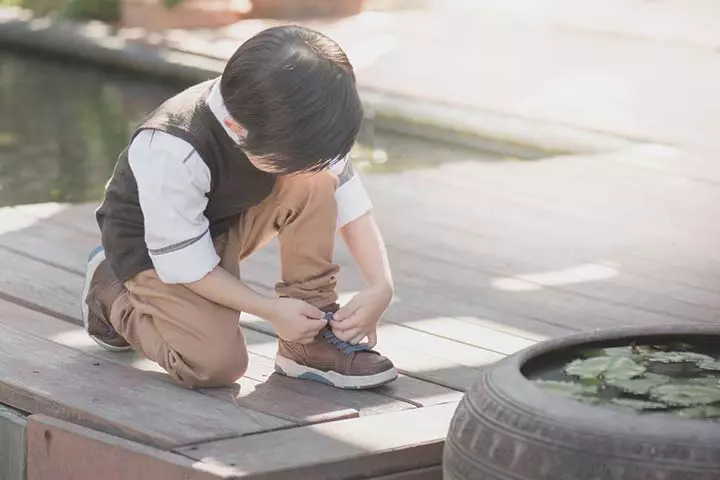 Learning The Art Of Tying A Shoelace