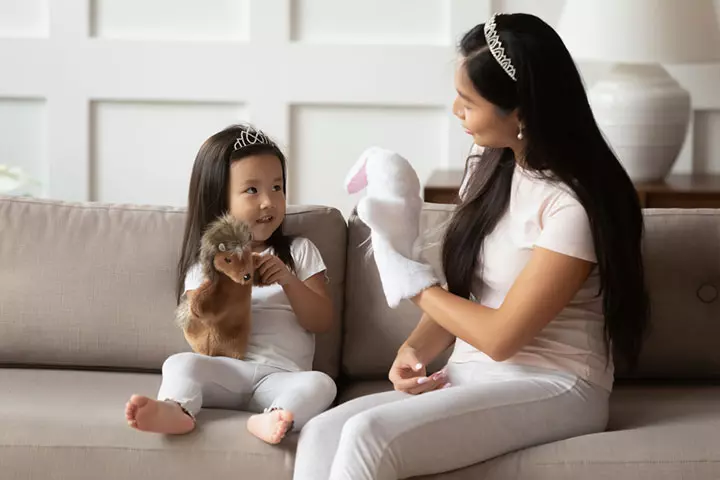 Teach About Facial Features By Pointing At Their Dolls