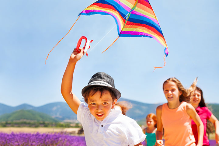 Children enjoying with a kite