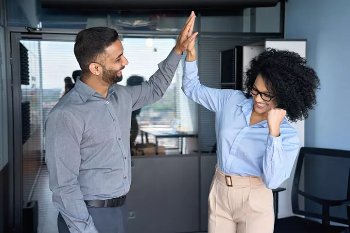 He is your biggest cheerleader, signs a male coworker likes you