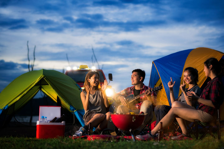 Singing around a campfire is a classic camping activity
