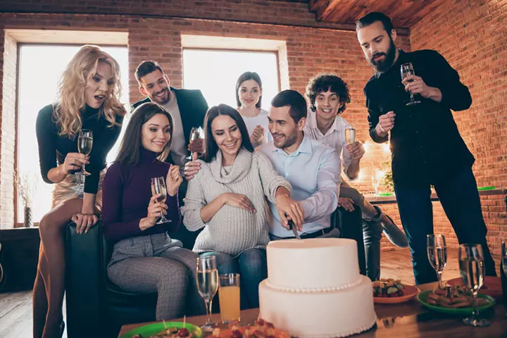 Soon-to-be dad and mom at baby shower 