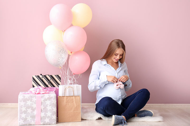 Woman with her baby shower gifts 