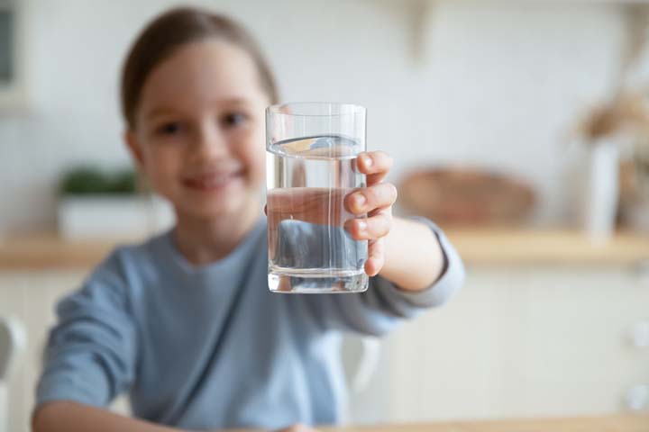 A child should drink plenty of water to maintain overall health.