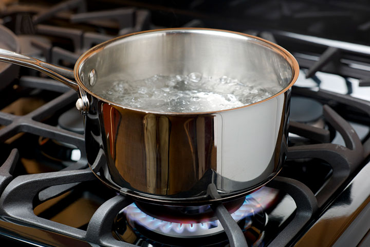 Arrange the tarnished silverware in foil and pour in hot water