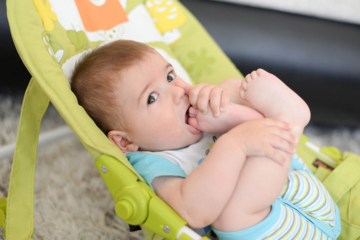 Babies put feet in their mouth