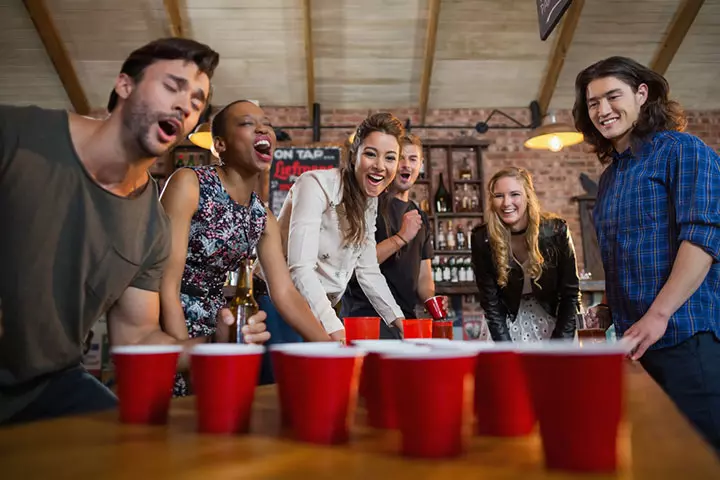 Beer pong is a popular drinking game adults play at parties