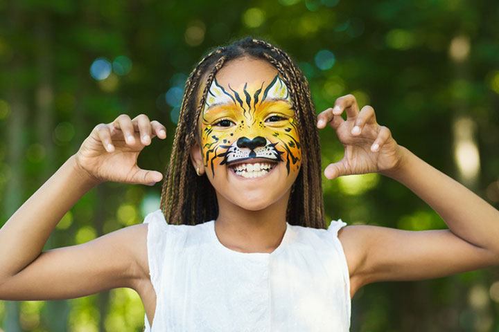 Bright Yellow, White, And Black Tiger Face Paints For Kids