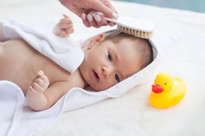 Brush the scalp for baby's hair growth