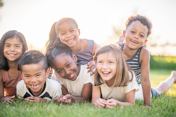 Children sharing laughter, quotes about friendship for kids