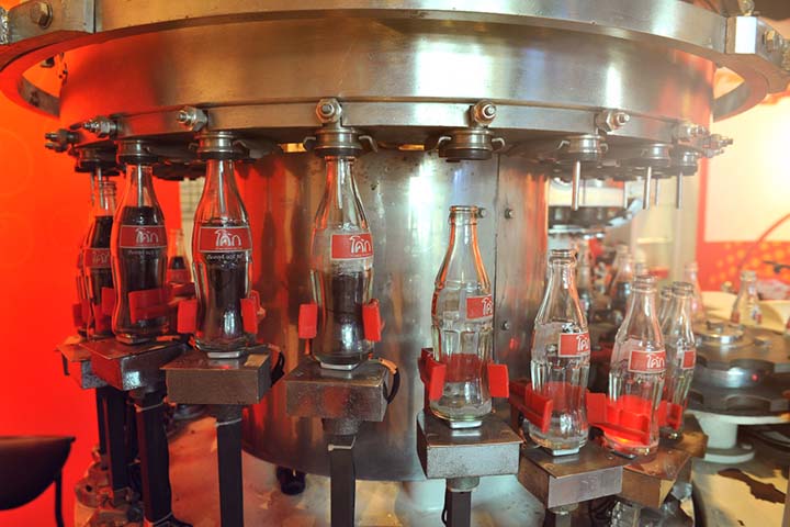 Coke is prepared by mixing water, sugar, caffeine, and carbon dioxide