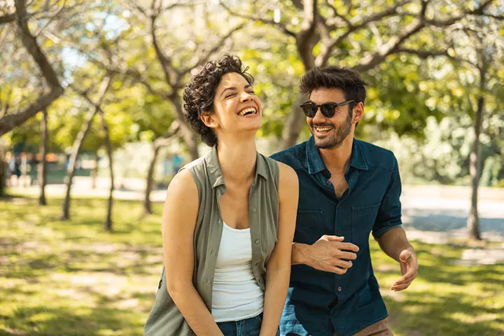 Couple laughing at a knock knock joke