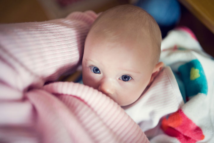 Dressing baby in warm clothes may cause sweating