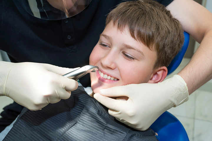 Extraction of tooth in children