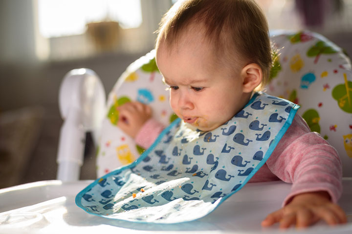If the baby is gagging, stay calm and let them throw up the food.