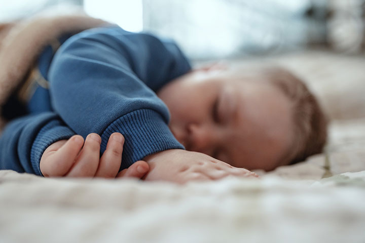 Make your toddler sleep with the sore ear up