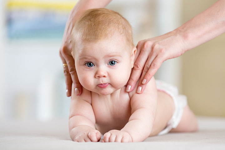 Massage the chest and shoulders of the baby