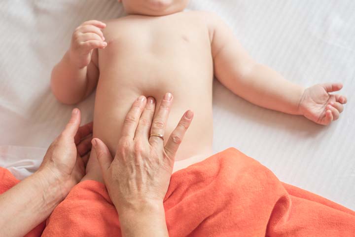 Massaging the baby’s tummy can be an effective alternative