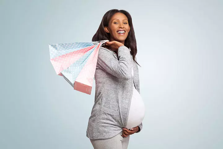 Pregnant woman shopping for her hospital bag