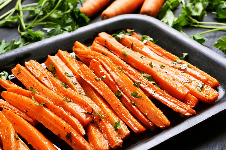 Roast carrots to serve as snacks