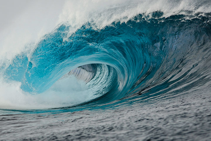 Some tsunami waves can reach a height of up to 125 feet.
