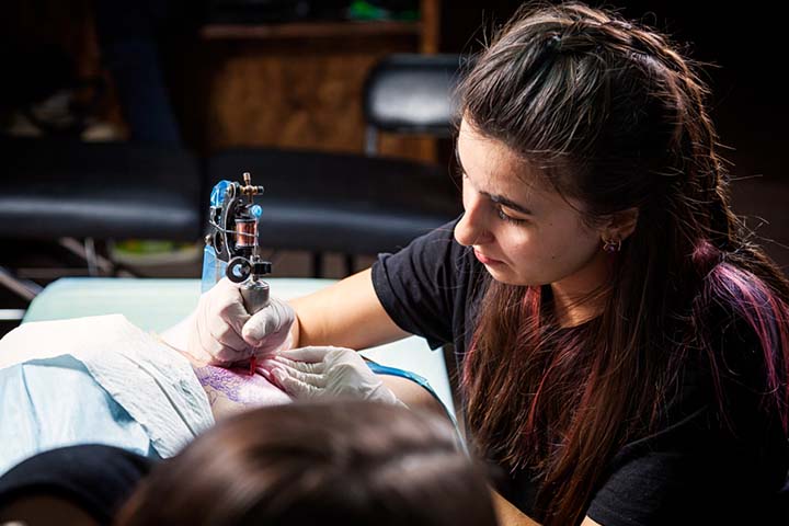 Tattooing is done with hand-held machines