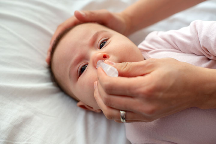Use saline drops or aspirator to clean the baby's nose